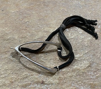 Lynne Mercein -&nbsp;Furcula bracelet on suede cord in sterling silver